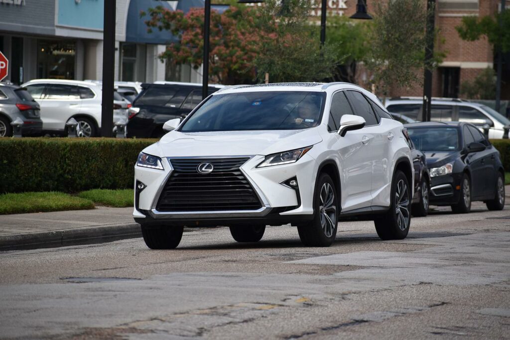 A Lexus GX SUV on the road.