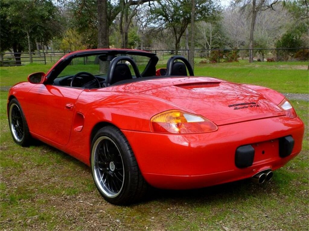 A red 2000 Porsche Boxster