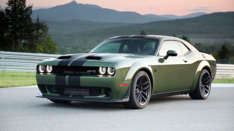 An army green 2022 Dodge Challenger RT car with a V8 engine. 