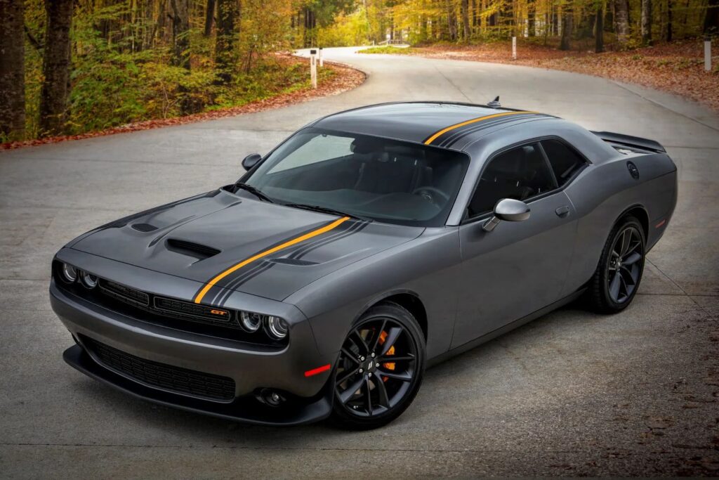 A parked grey 2022 Dodge Challenger GT with sporty trim on the hood