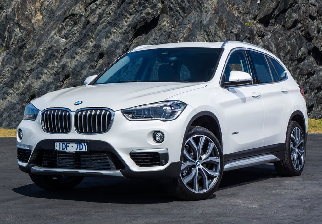 A parked white 2017 BMW X1