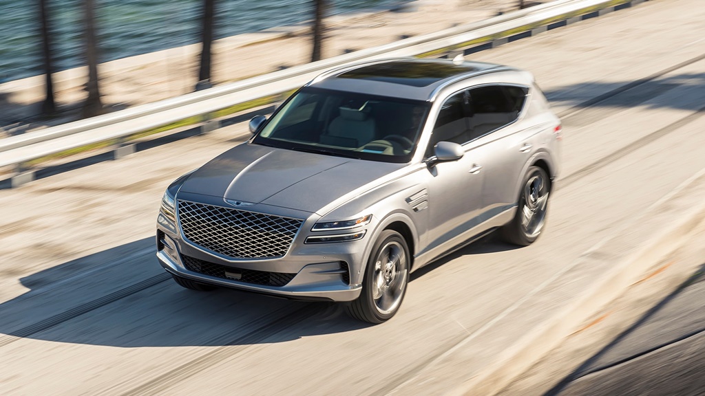 A silver 2022 Genesis GV80 on the road