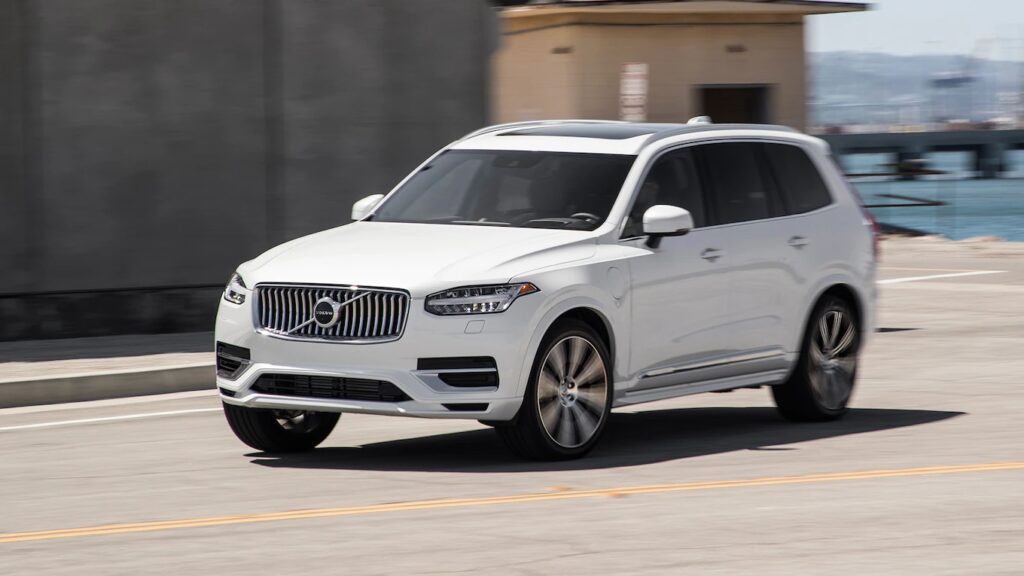 A white 2023 Volvo XC90 making a turn