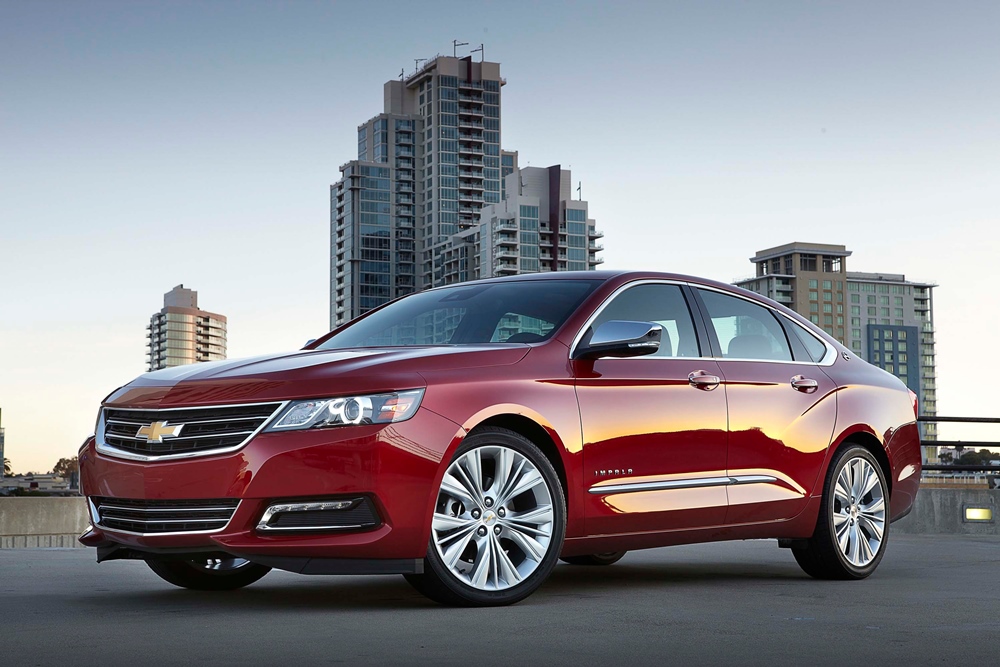 A parked red 2018 Chevrolet Impala