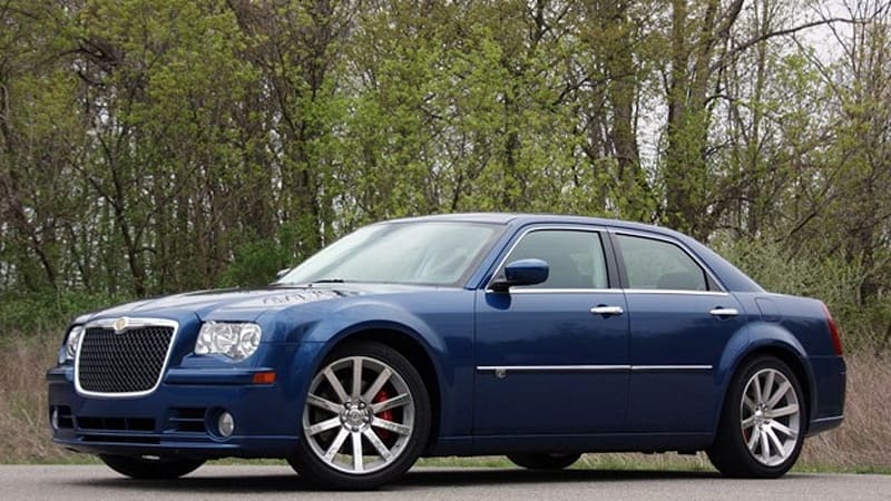 A parked blue 2010 Chrysler 300 SRT8