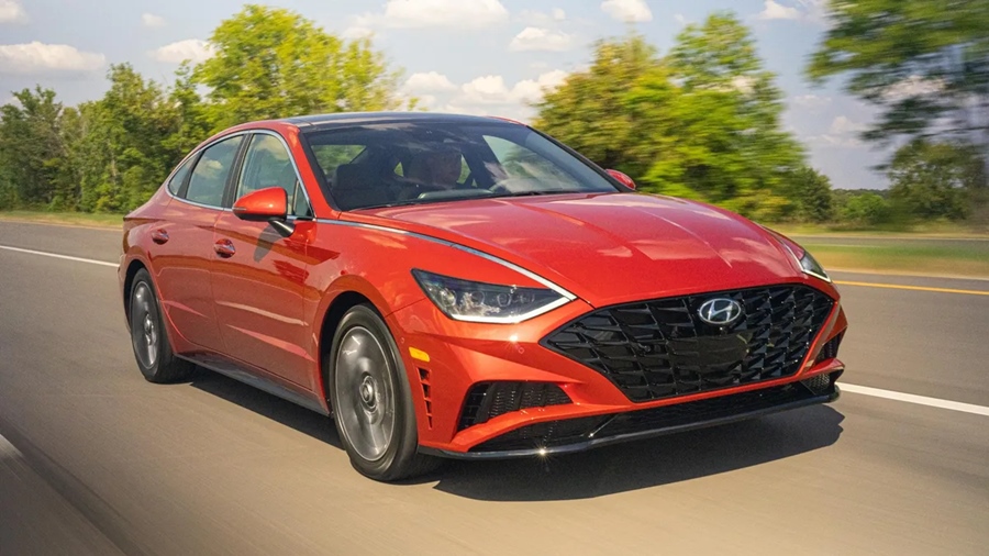 An orange 2020 Hyundai Sonata on the road