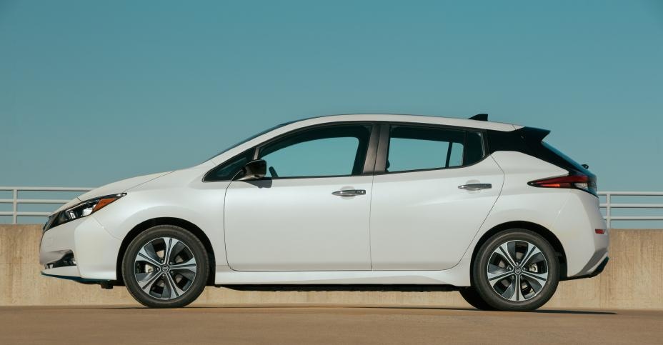 A parked white 2020 Nissan Leaf S Plus