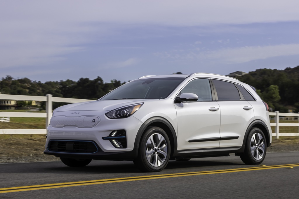 A white 2022 Kia Niro EV on the road