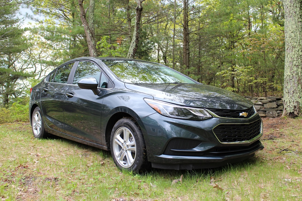 A parked dark blue 2017 Chevrolet Cruze