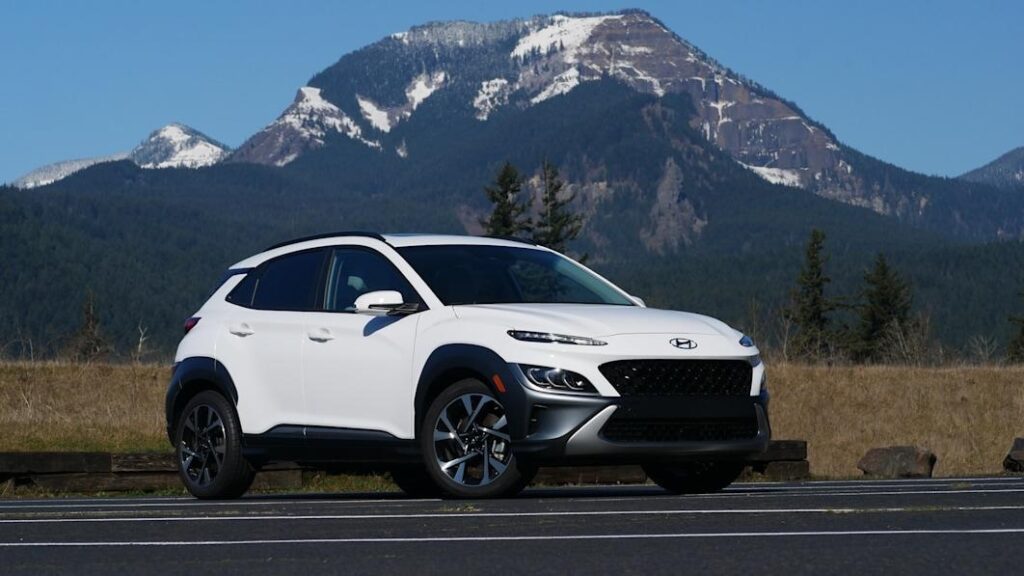 A parked white 2023 Hyundai Kona