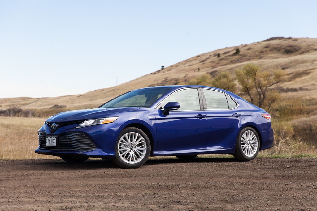 A parked blue 2018 Toyota Camry