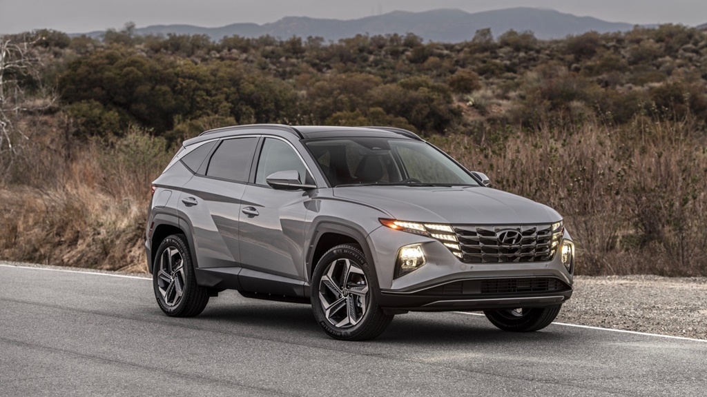 A parked silver 2022 Hyundai Tucson Hybrid