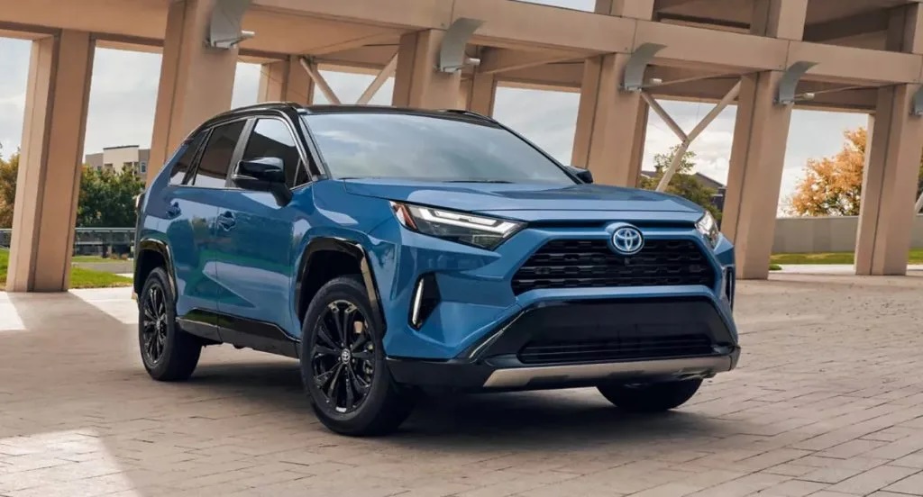 A parked blue 2022 Toyota RAV4 Hybrid