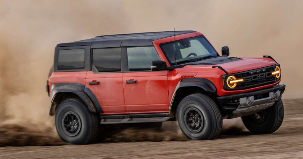 An orange 2022 Ford Bronco going off the beaten path