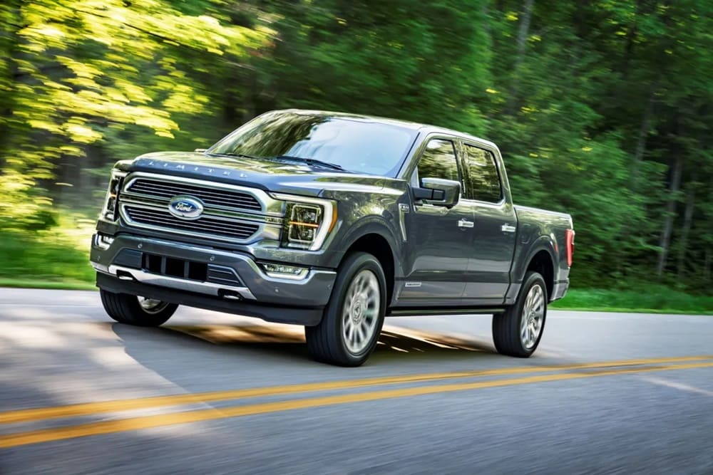 A silver 2022 Ford F-150 on the road