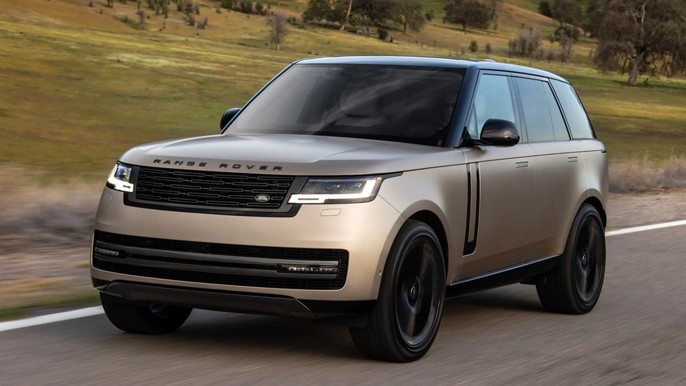A rose gold 2022 Land Rover Range Rover on the road