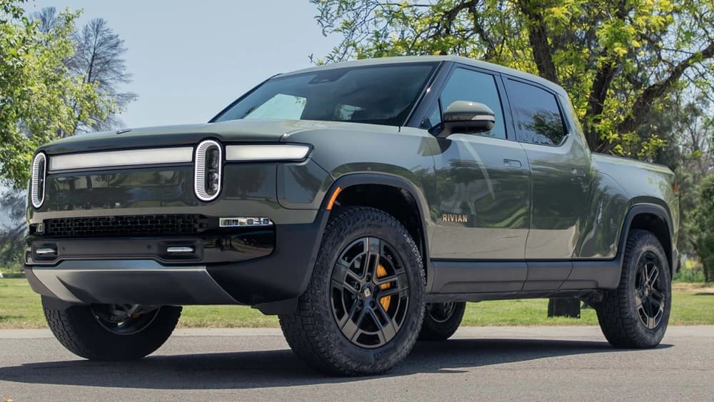 A parked green/grey 2022 Rivian R1T