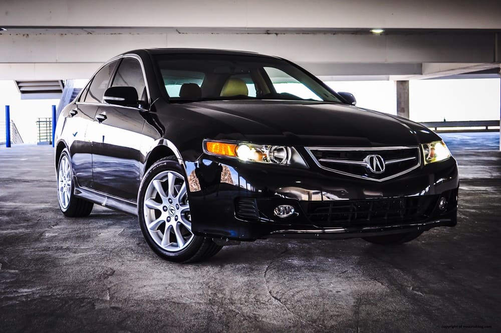 A parked black 2008 Acura TSX