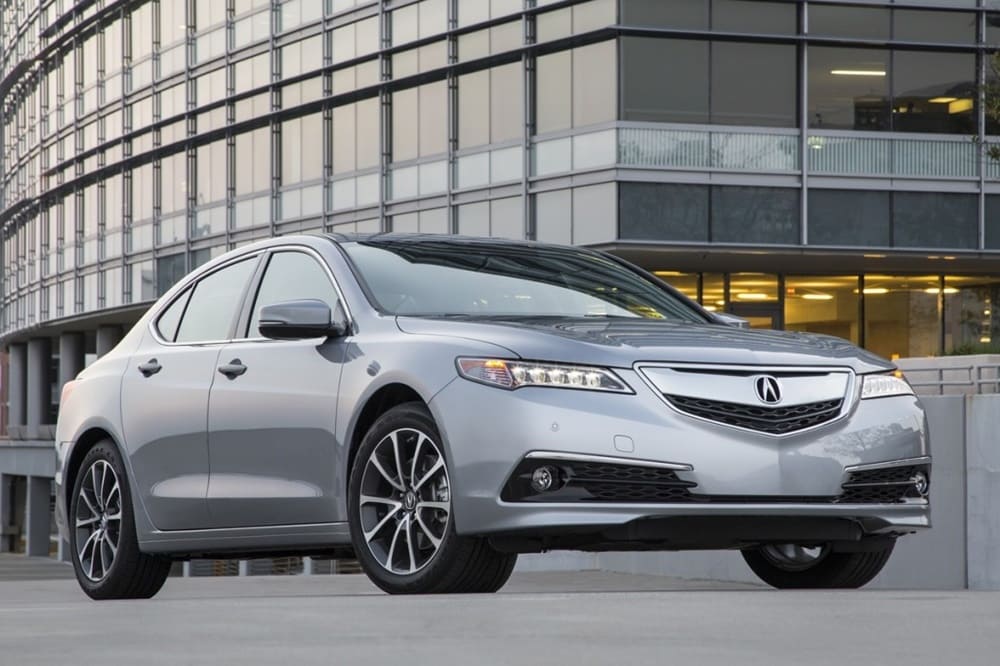 A parked silver 2016 Acura TLX