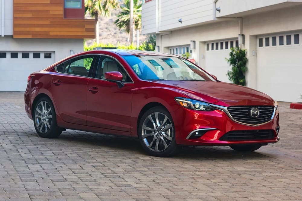 A parked red 2017 Mazda 6