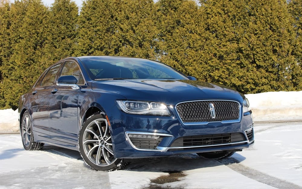 A parked blue 2018 Lincoln MKZ