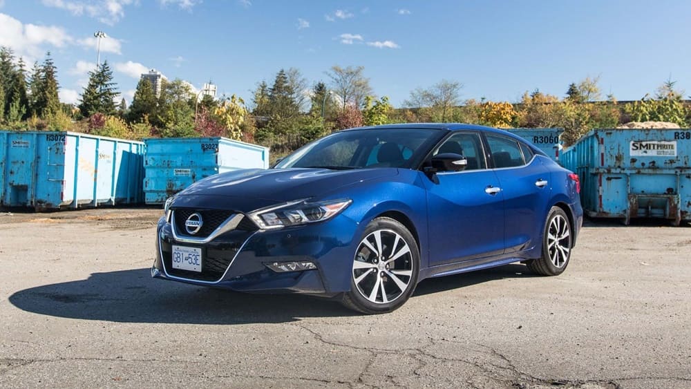 A parked blue 2018 Nissan Maxima