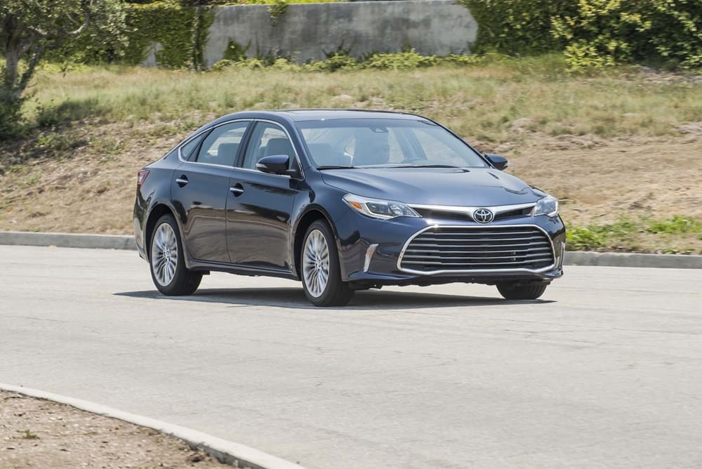 A black 2018 Toyota Avalon on the road