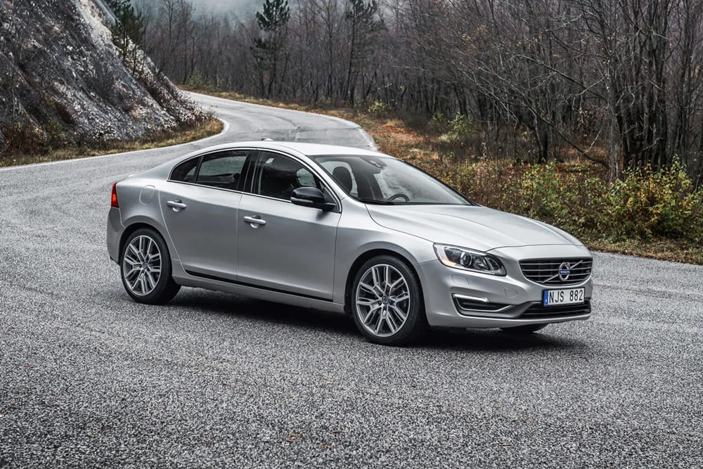 A silver 2018 Volvo S60 on the move