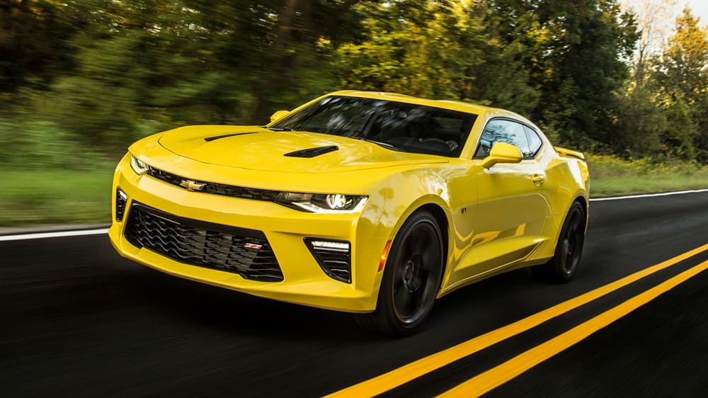 A yellow 2022 Chevrolet Camaro on the move