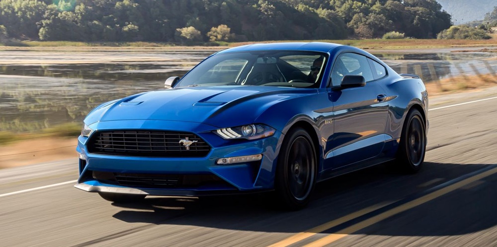 A blue 2022 Ford Mustang EcoBoost on the road