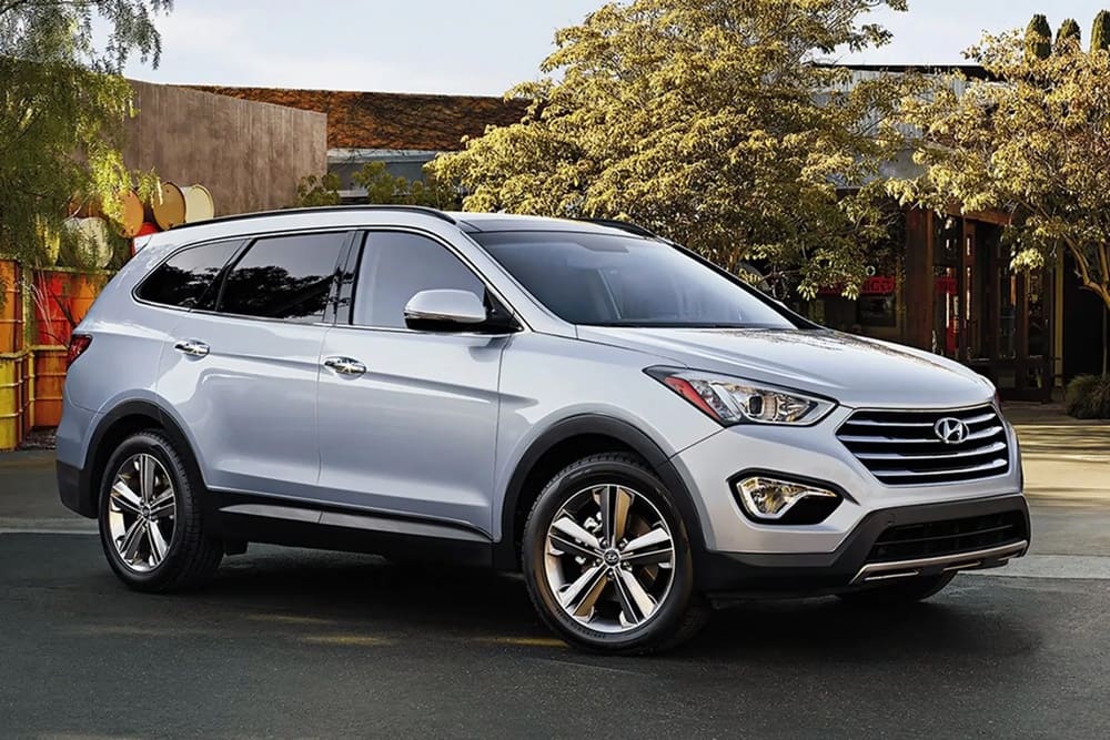 A parked silver 2016 Hyundai Santa Fe