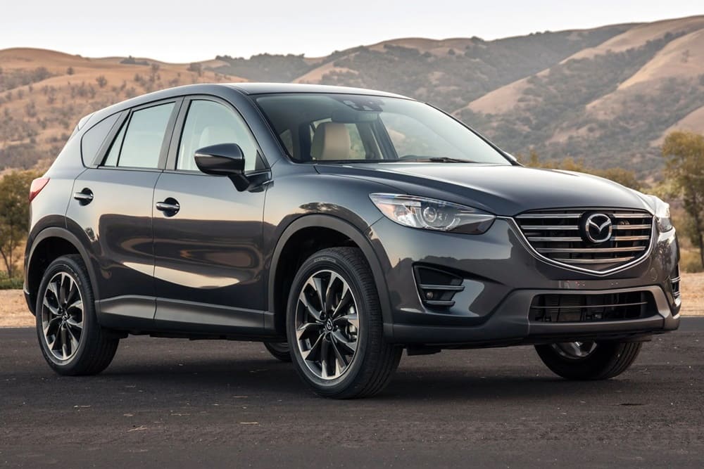 A parked grey/silver 2016 Mazda CX-5