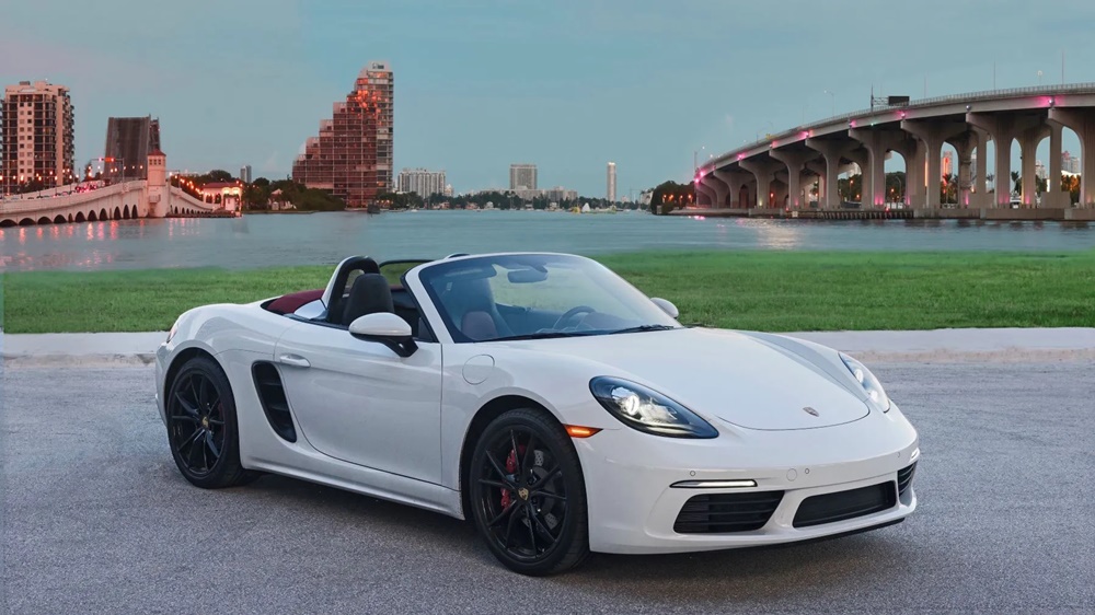 A parked white 2022 Porsche 718 Boxster