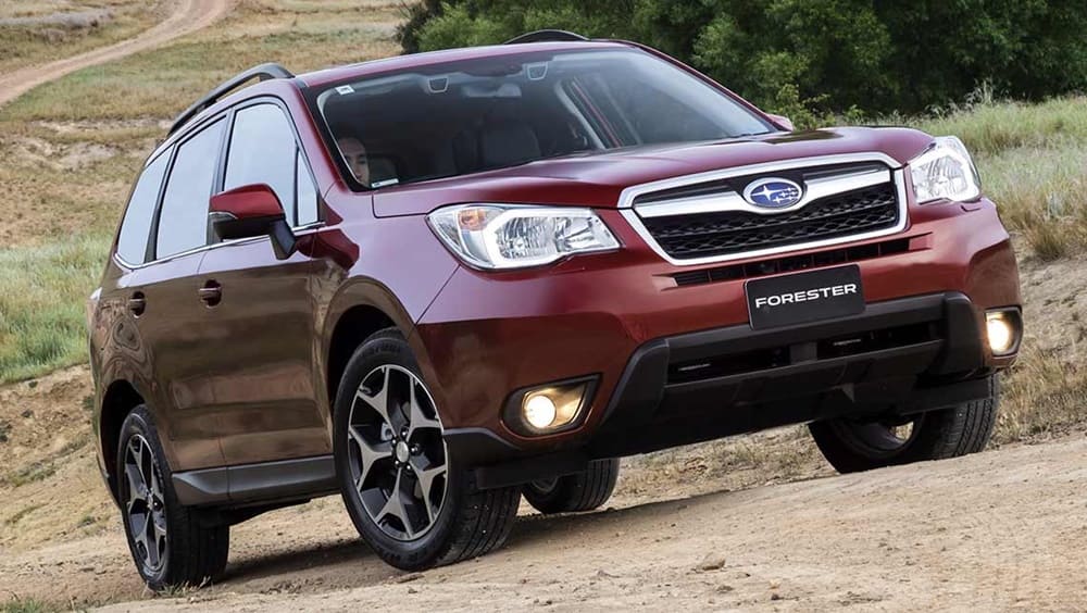 A parked red 2015 Subaru Forester