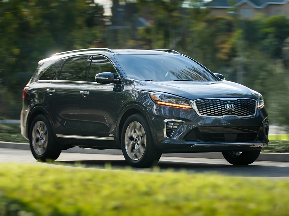 A dark grey 2019 Kia Sorento on the move