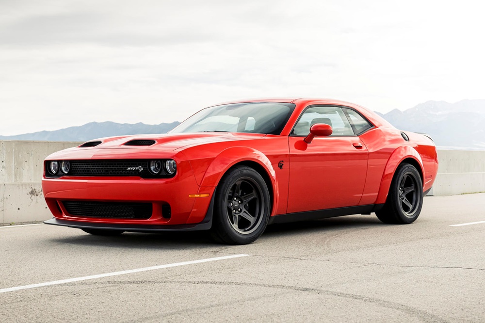 A parked dark orange 2022 Dodge Challenger SRT Super Stock