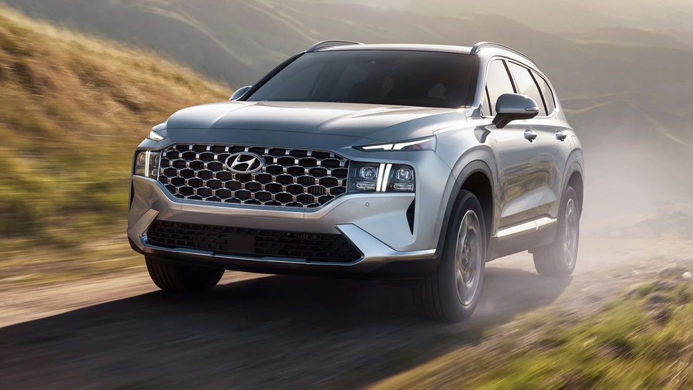 A silver 2022 Hyundai Santa Fe PHEV on the trail