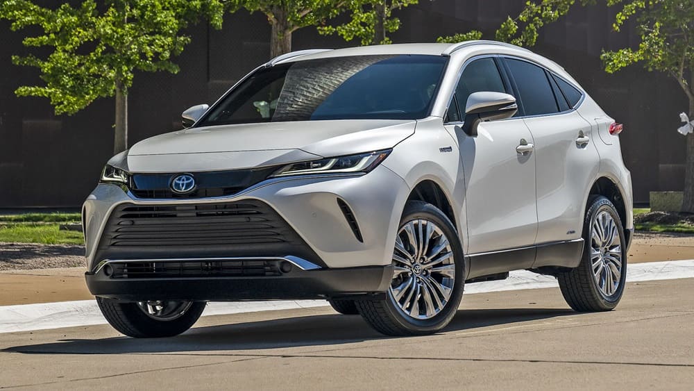 A silver 2022 Toyota Venza taking a turn