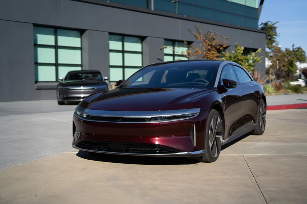A parked Zenith Red 2023 Lucid Air
