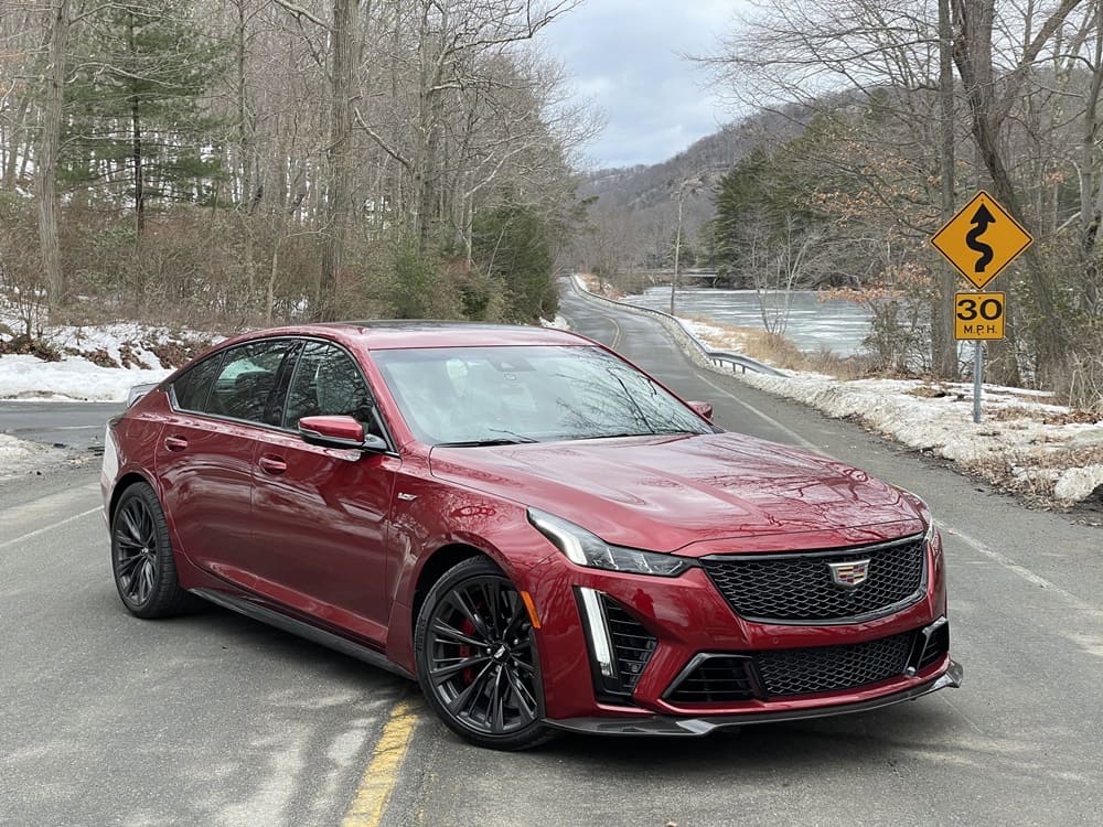 A parked red Cadillac CT5-V Blackwing posing on the road
