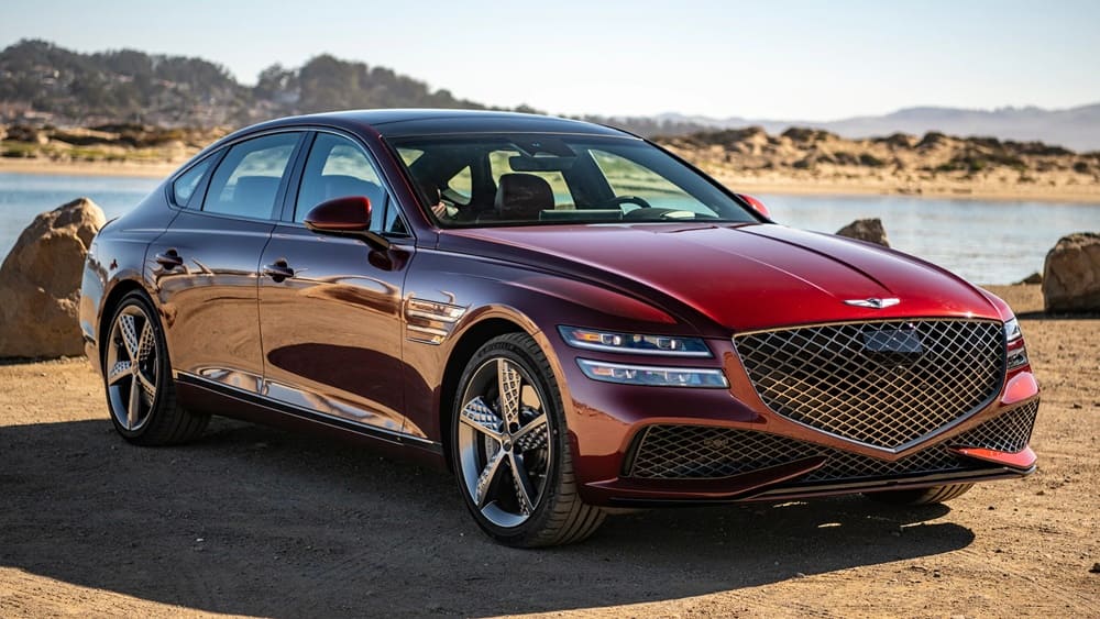 A parked red 2022 Genesis G80