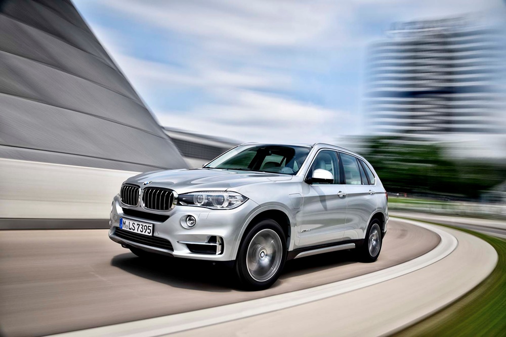 A silver 2017 BMW X5 on the move