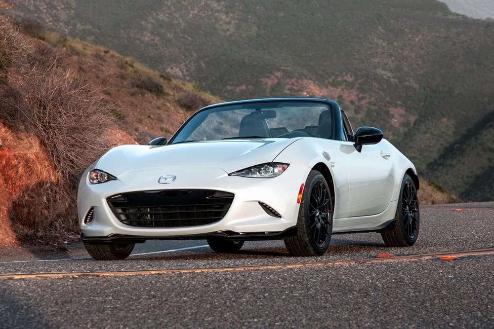 A parked white 2017 Mazda MX-5 Miata