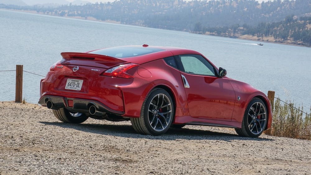 A parked red 2018 Nissan 370Z NISMO