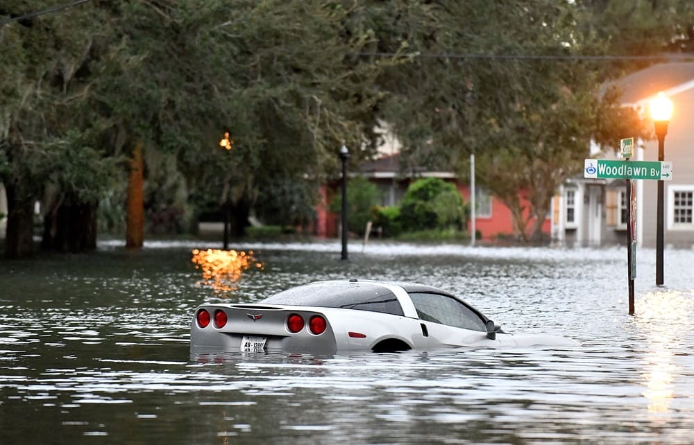 A sports car caught in flood waters