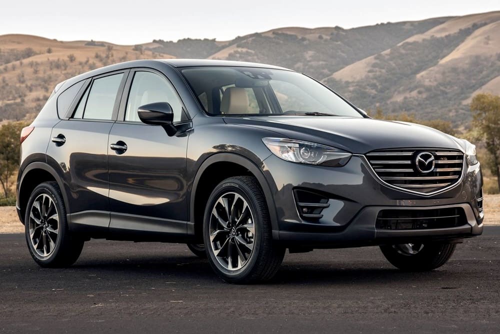 A parked silver/black 2016 Mazda CX 5