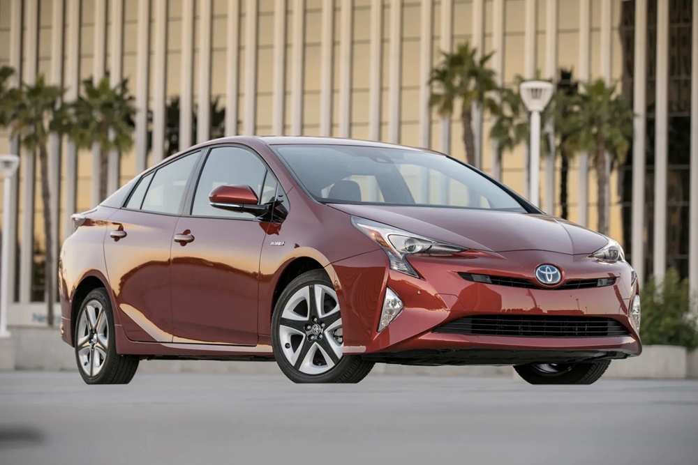 A parked red 2017 Toyota Prius
