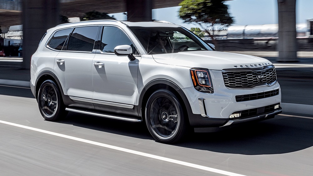 A white 2020 Kia Telluride on the road