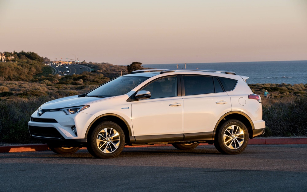 A parked white 2017 Toyota RAV4