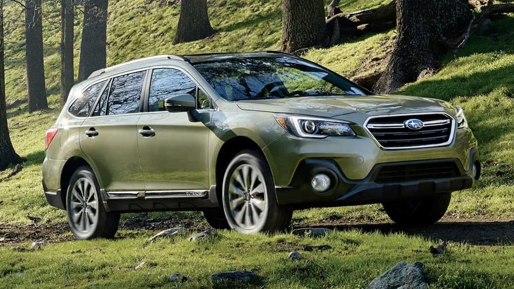 A parked green 2018 Subaru Outback